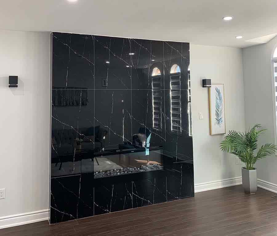 Dark built-in cabinetry with open display shelving