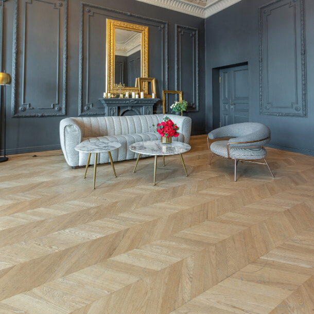 Finished residential interior with wood flooring and coordinated wall details